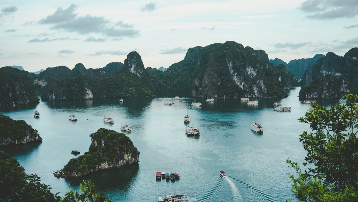 Boats among limestone islands in Ha Long Bay, Vietnam