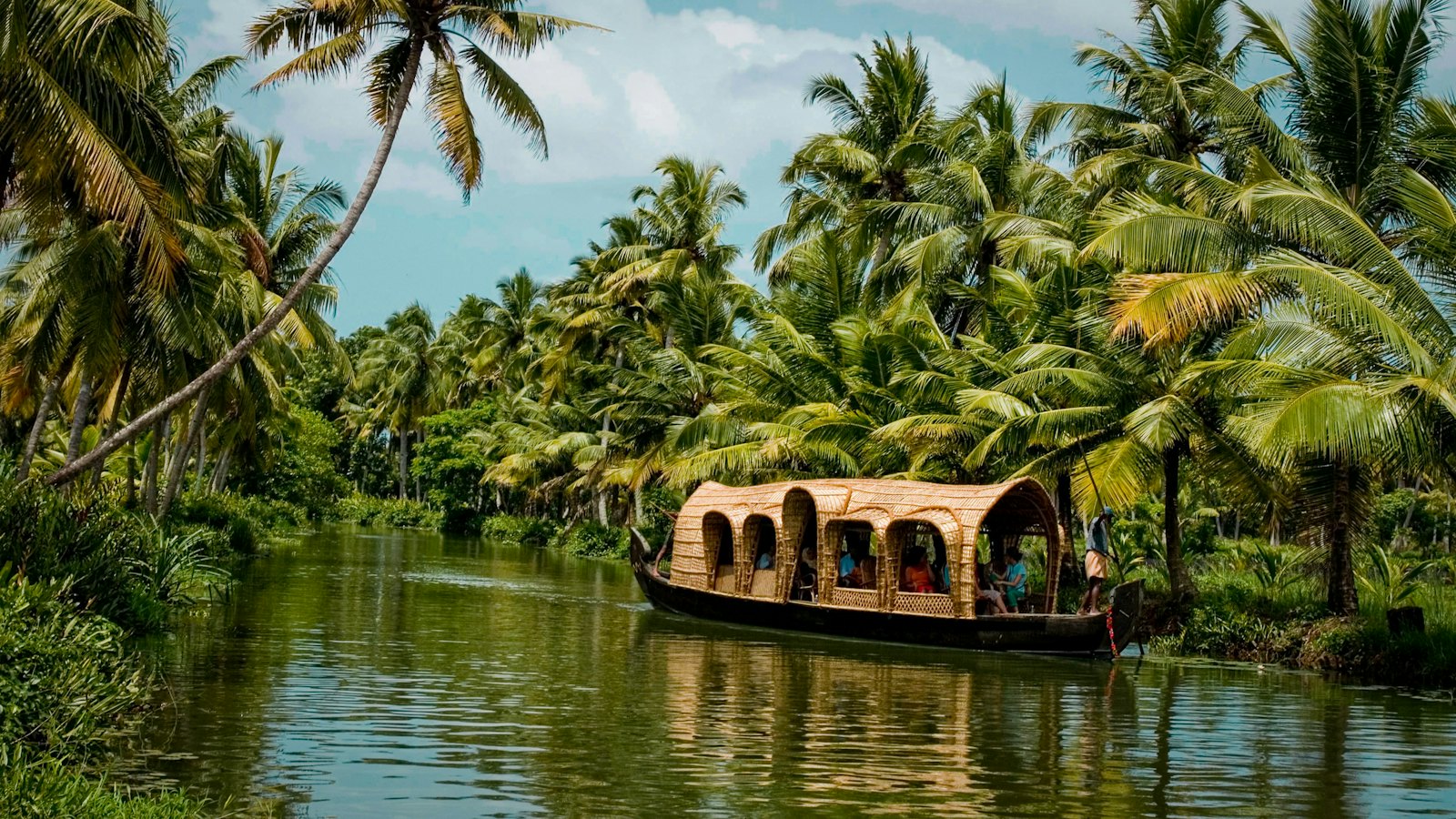 Houseboat on the palm-lined Kerala backwaters
