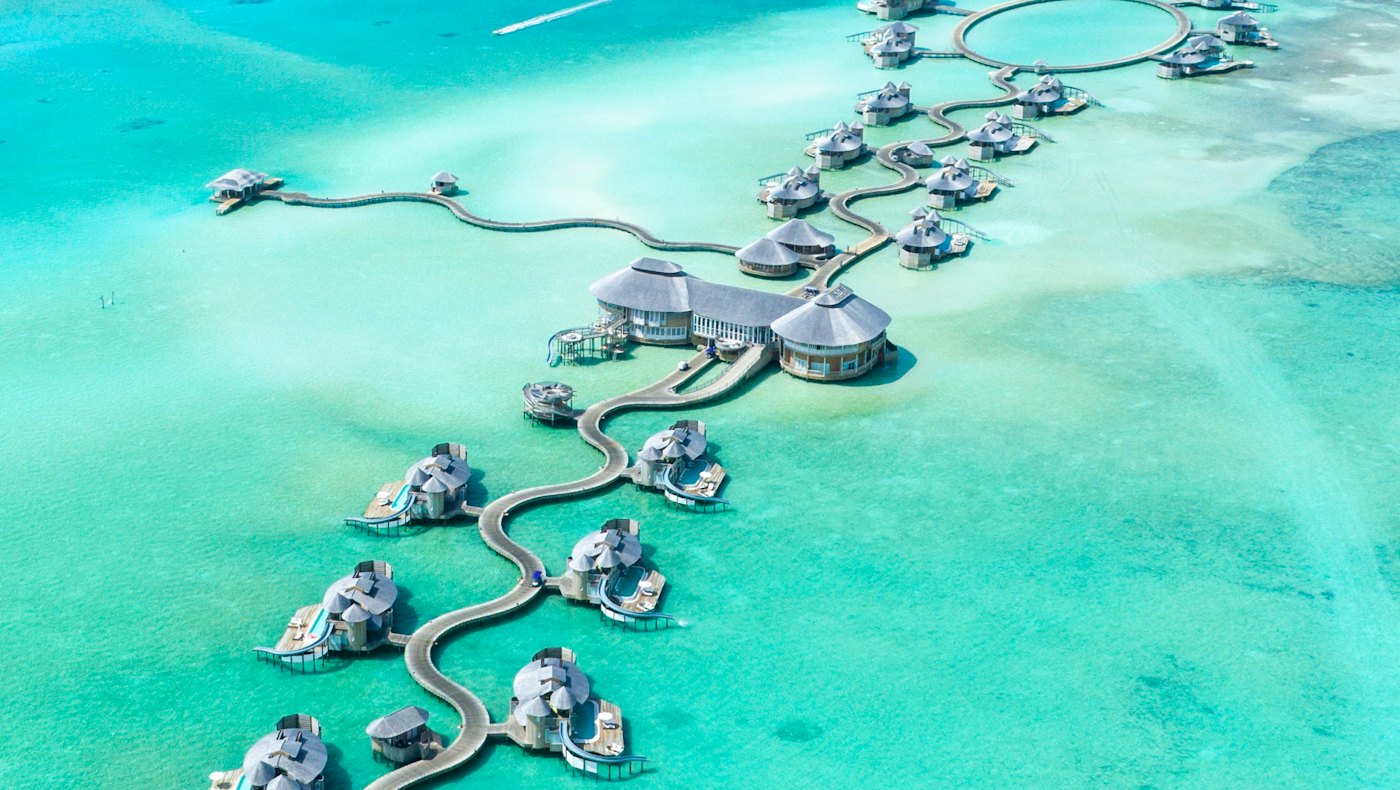 Aerial view of overwater villas in the Maldives